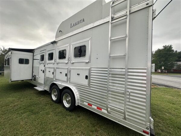 2014 Lakota Bighorn 8416, Generator, Couch, Dinette 17’ Shortwall, 4 Horse Trailer, 12′ Slide.