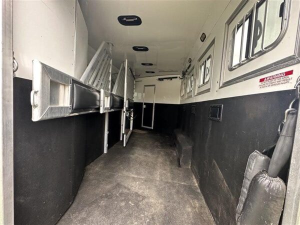 2014 Lakota Bighorn 8416, Generator, Couch, Dinette 17’ Shortwall, 4 Horse Trailer, 12′ Slide.