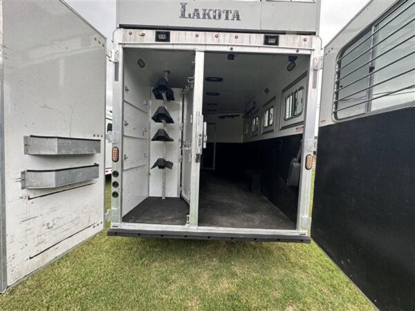 2014 Lakota Bighorn 8416, Generator, Couch, Dinette 17’ Shortwall, 4 Horse Trailer, 12′ Slide.