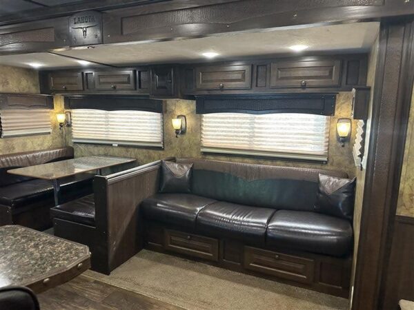 2014 Lakota Bighorn 8416, Generator, Couch, Dinette 17’ Shortwall, 4 Horse Trailer, 12′ Slide.